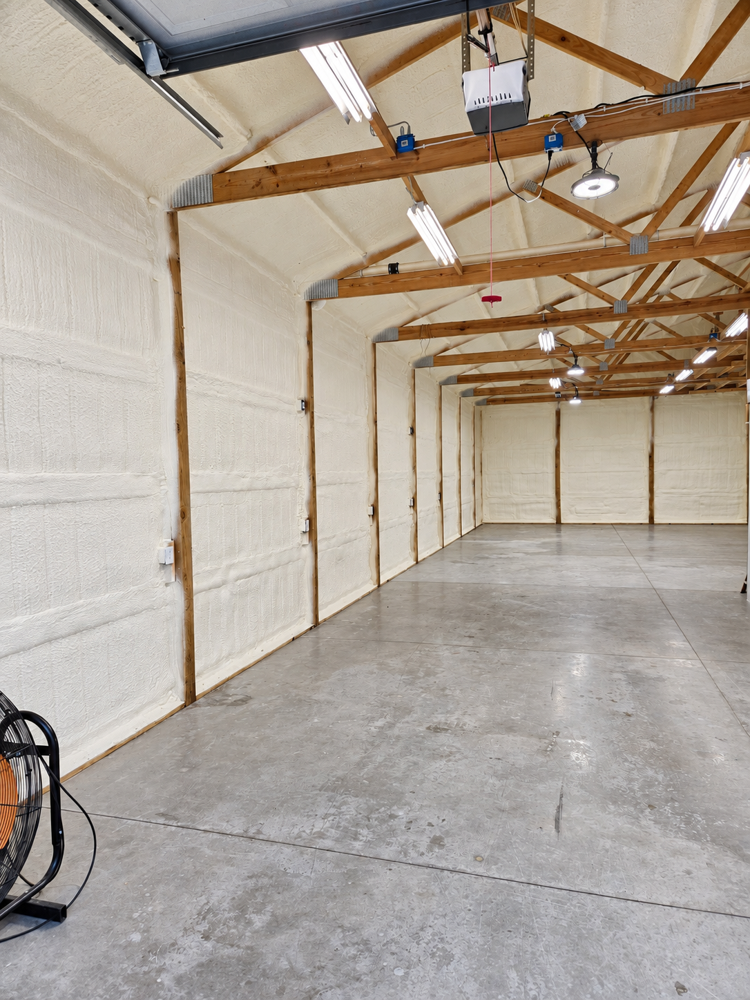 Completed insulation work inside a spacious workshop